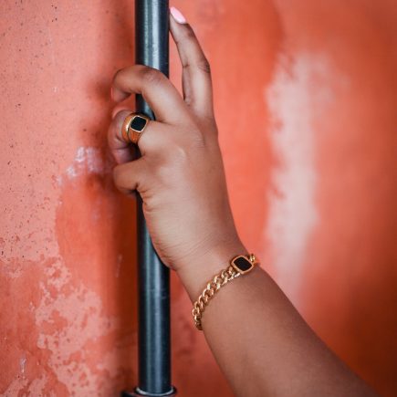 Onyx Ring and onyx bracelet on model arm 
